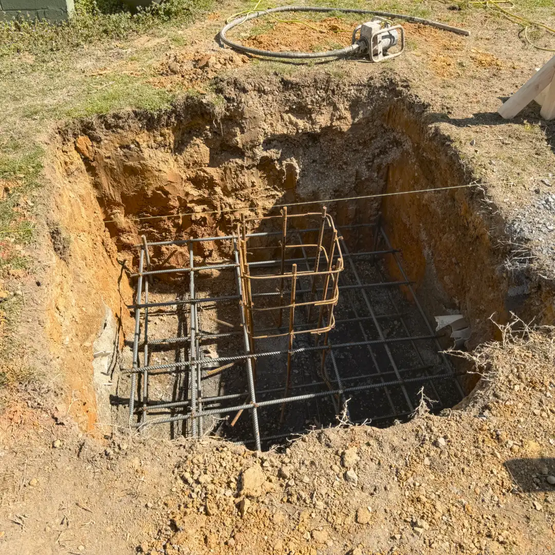 Site prep concrete footer hole ready for concrete