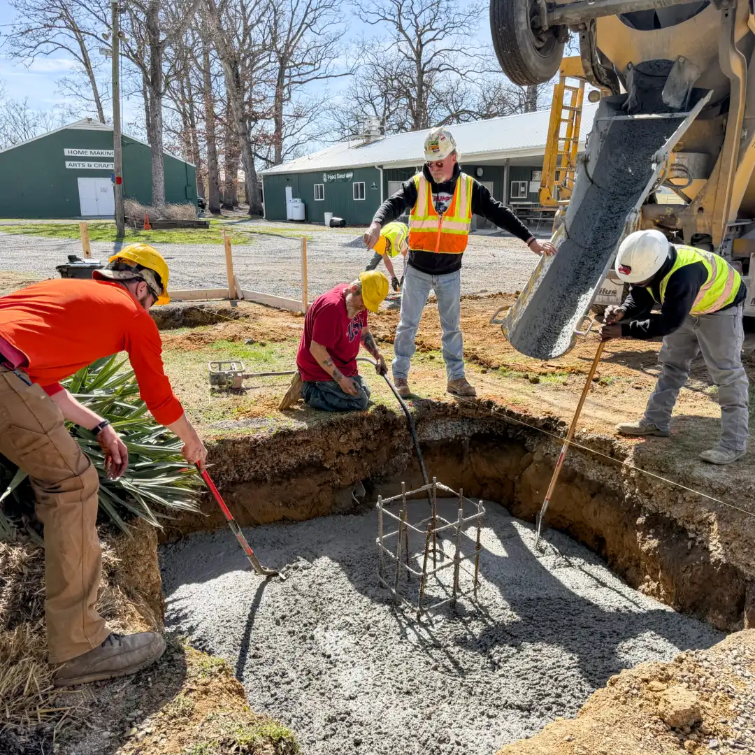 Pine Knoll crew doing site work and site prep for concrete services and concrete footers.