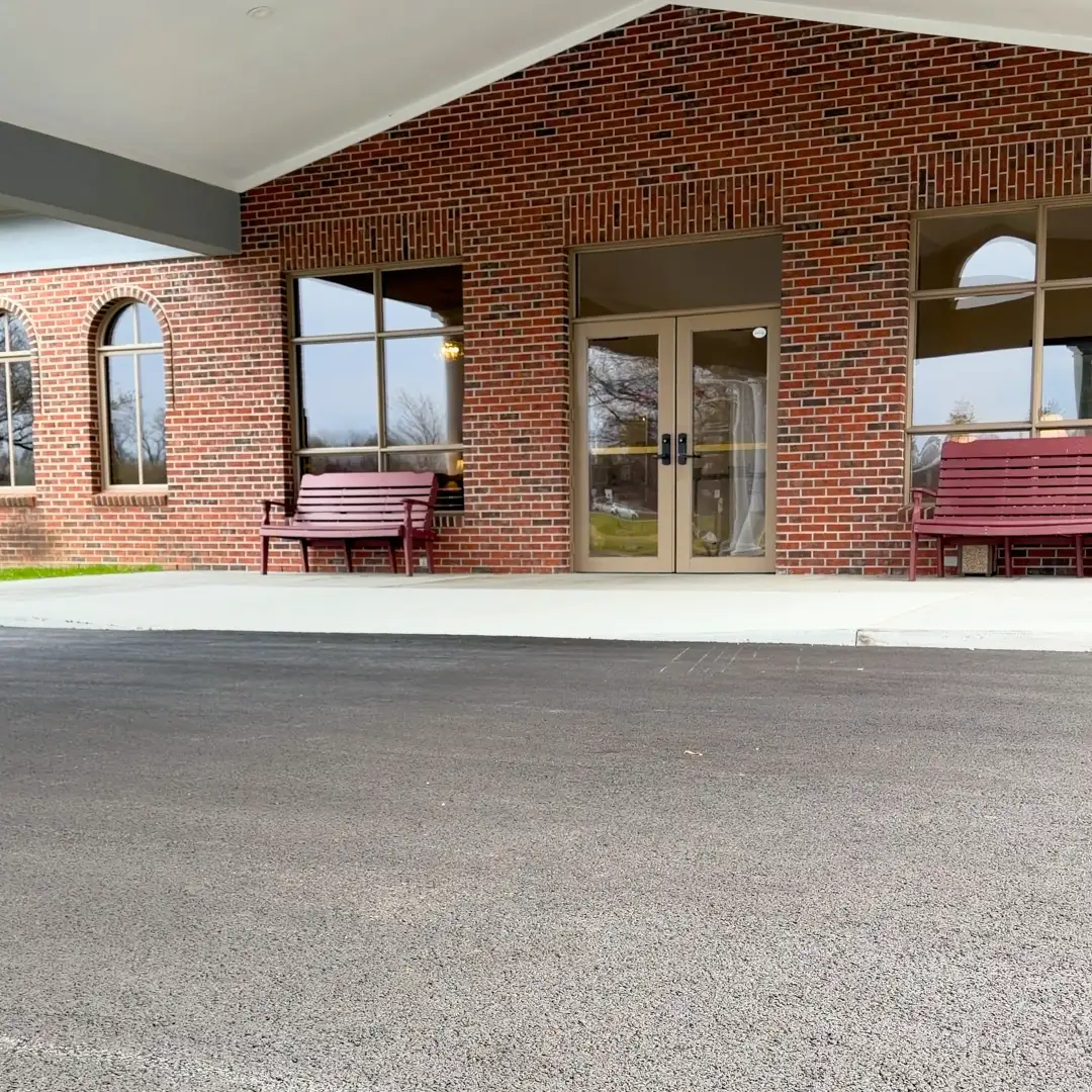 Concrete ramp installed during site work, paving and concrete services provided for Shirley Funeral Home