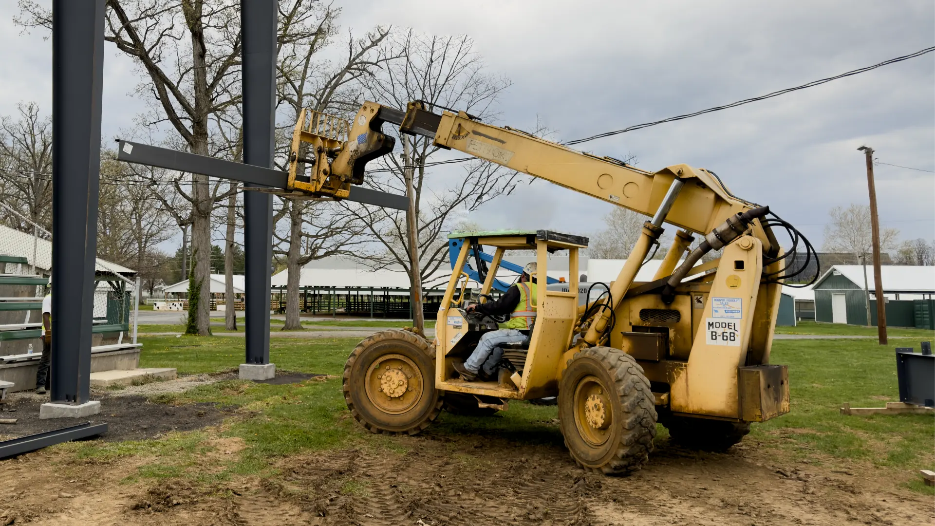 Telehandler installed a steel beam for a site work project