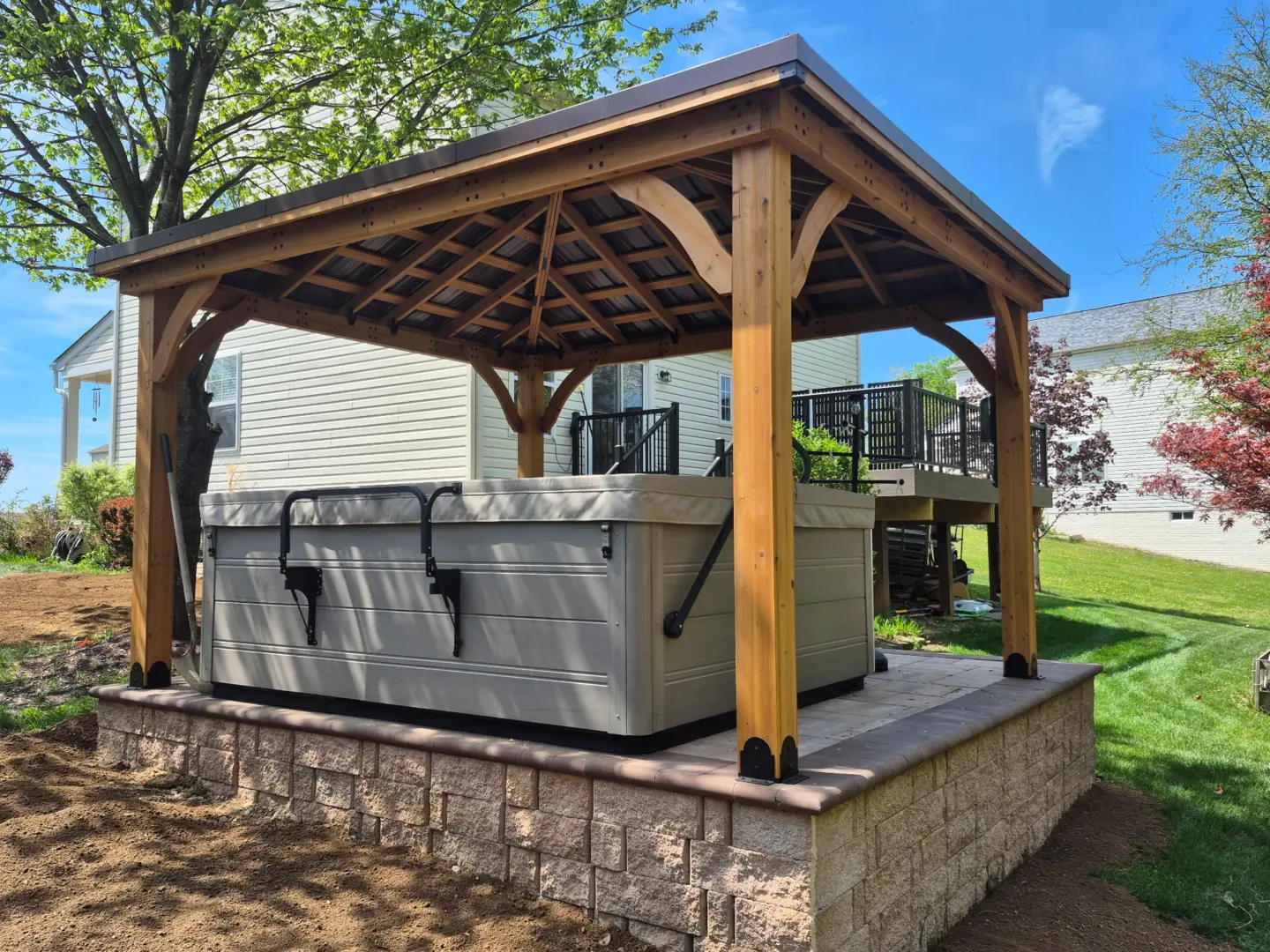 Gazebo, hot tub, and other exterior upgrades for renovation.