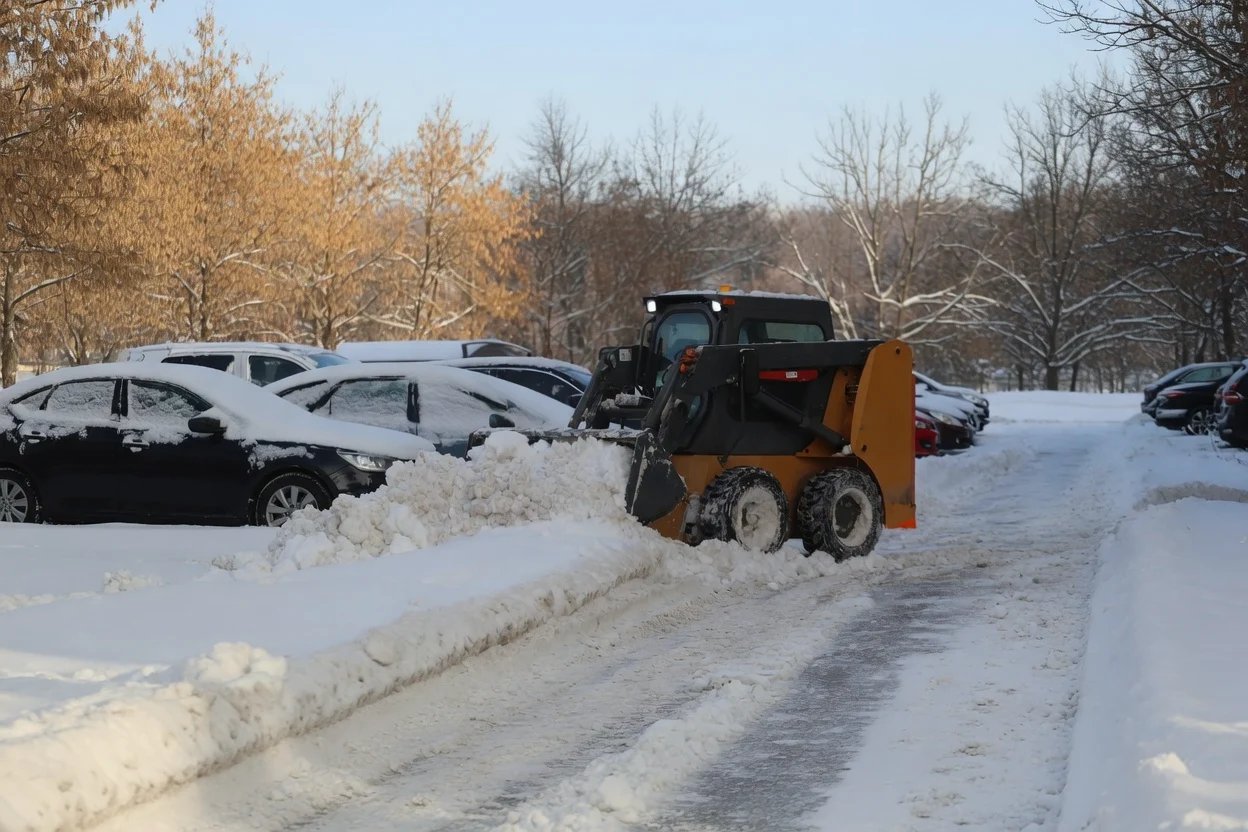 Pine Knoll Construction completing snow removal in the Winchester and surrounding area.